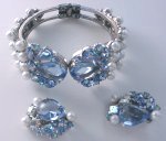 A great blue rhinestone and pearl bracelet and matching clip-earring set from Schiaparelli!