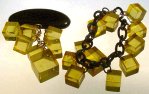 What a unique applejuice bakelite bracelet and matching pin!