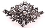 This is a huge diamond brooch dating from the end of the 19th century.