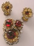 This brooch and earrings set is an incredible example of Miriam Haskell's hand-crafted jewelry!