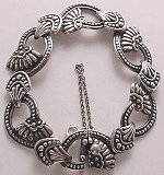 Here's a wonderful silver bracelet by Margot de Taxco!