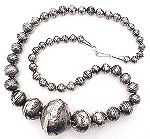 Hand crafted Navajo hollow silver beads in graduated sizes -- fabulous!