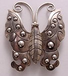 What a great art deco butterfly -- straight out of Alice in Wonderland!