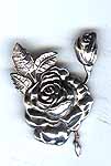Sterling silver rose brooch by Margot de Taxco.
