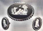 Classic and highly collectible Wedgewood jasper ware brooch and earrings.